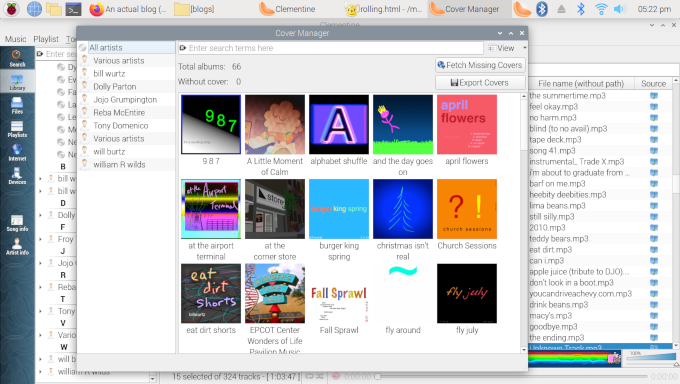Screenshot of my desktop with Clementine music player open
			and it's cover manager dominating the screen, 
			showing some colorful cover art.